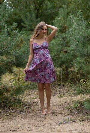 Lenta exhibits her beauty in the forest like a wild flower on nudesceleb.com