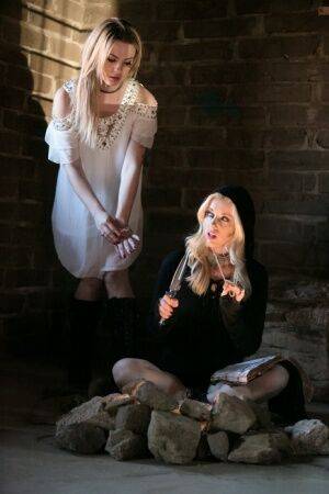 Fully clothed teens Dahlia Sky and Charlotte Stokely model in cosplay garb on nudesceleb.com