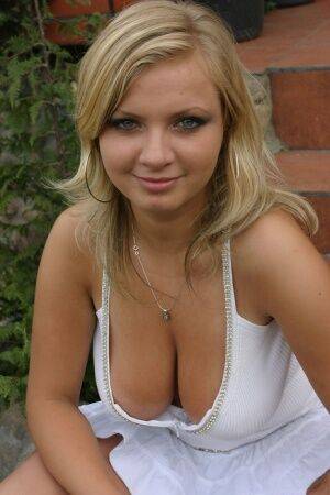 Young blonde girl Malina May flaunts her great tits outside her house on nudesceleb.com