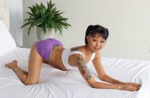 Tattooed Asian girl Saya Song has POV sex with a big white cock on nudesceleb.com