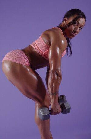 Black bodybuilder Karen Garrett displays her muscled physique on nudesceleb.com
