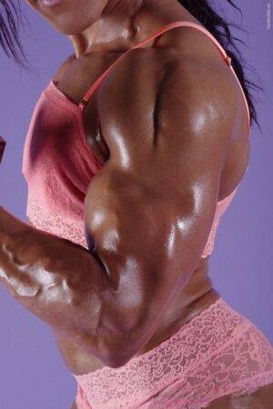 Female bodybuilder Karen Garrett flexes her muscles in lingerie on nudesceleb.com