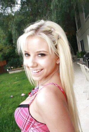 Tiny blonde teen Tessa Taylor revealing nice tits and tit ass on lawn on nudesceleb.com