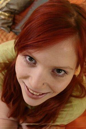 Young redhead has sexual intercourse with an older man in bumble bee socks on nudesceleb.com