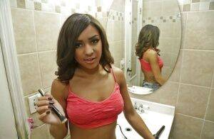 Amateur black babe Nicole flaunting big natural saggy tits in bathroom on nudesceleb.com