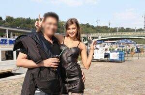 Skinny teen Maria in black leather dress strips naked at a public venue on nudesceleb.com