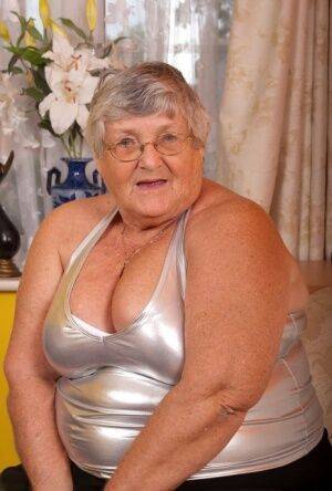 Old fatty Grandma Libby masturbates with a vibrator in crotchless pantyhose on nudesceleb.com