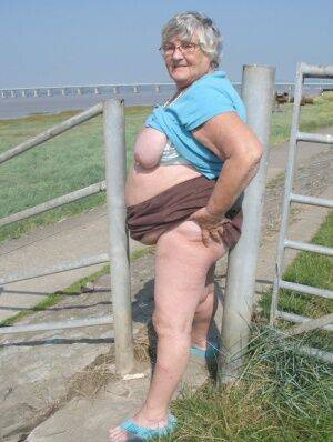Fat old woman Grandma Libby exposes herself on a desolate bike path on nudesceleb.com