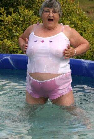Overweight UK nan Grandma Libby exposes her boobs in a backyard swimming pool - Britain on nudesceleb.com