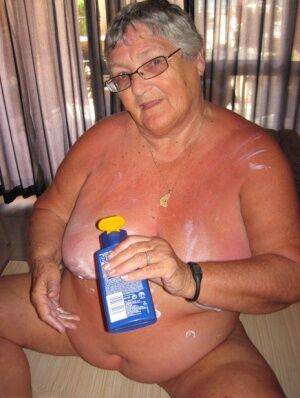Obese old woman Grandma Libby covers her naked body in lotion on nudesceleb.com