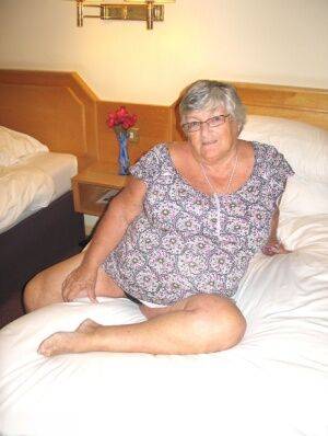 Silver haired British woman Grandma Libby exposes her fat body on a bed - Britain on nudesceleb.com