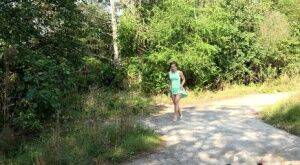 White chick pulls down her panties and squats for a piss on a country path on nudesceleb.com