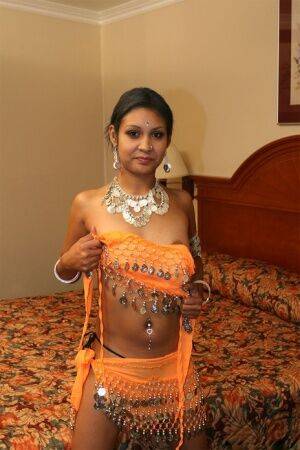 Indian female Dipti flashing her ass and nipples in her bedroom - India on nudesceleb.com