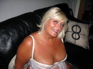 Overweight blonde Chrissy Uk exposes herself in white lingerie and nylons on nudesceleb.com