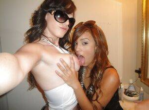 Lesbians Jennifer White and Melanie Rios tongue kissing in bathroom and bedrom on nudesceleb.com