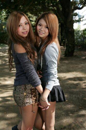 Beautiful Japanese schoolgirls Tsubasa and Kanon making out in public - Japan on nudesceleb.com