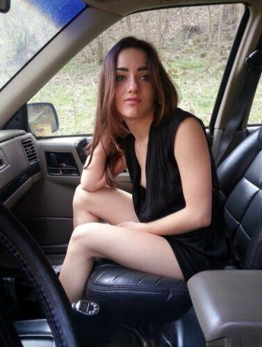 Horny girl Kasia Kelly takes selfies while playing with her pussy inside a car on nudesceleb.com