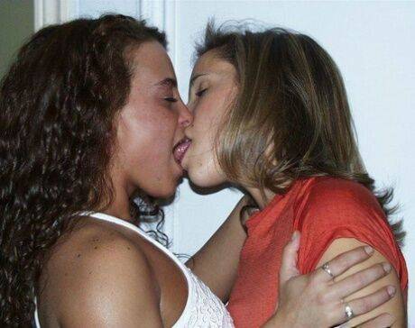 Amateur chicks tongue kiss before undressing for a lesbian experience on nudesceleb.com