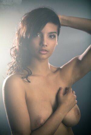 Beautiful Desi female removes her dress to expose her big natural boobs on nudesceleb.com