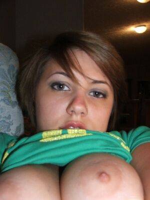 Young looking amateur takes self shots of her big natural boobs on nudesceleb.com