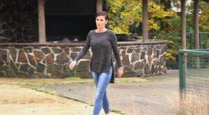 Busty Gabriellla Gucci in jeans undressing and pissing in public on nudesceleb.com