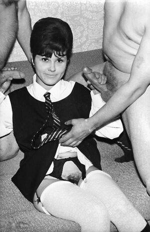 Small titted vintage schoolgirl removes her uniform for a big cock threesome on nudesceleb.com