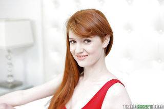 Young redhead amateur abbey rain displays her delicious pale body on nudesceleb.com