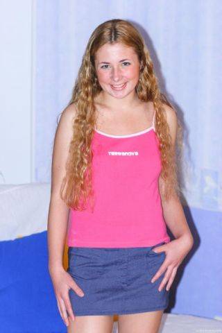 Curly haired blonde teen angel pleasing her pink pussy hard on nudesceleb.com