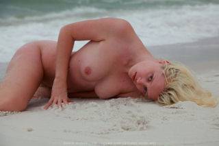 Frolicking naked in the ocean on nudesceleb.com