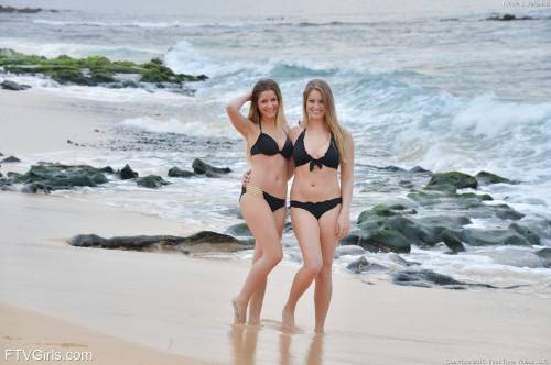 Curious girls Teddi Rae and Veronica Weston make soft lesbian action on the beach on nudesceleb.com