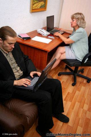 It guy stays in the office and gets seduced by a slutty mature blonde on nudesceleb.com