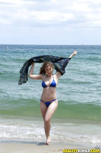 Seductive american cutie Lena Paul in beautiful bikini exposes big knockers and hot butt at beach - Usa on nudesceleb.com