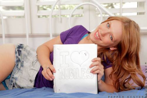 Redhead Pepper Kester Spreads Her Long Legs And Fills Her Pink Love Hole With Toys on nudesceleb.com