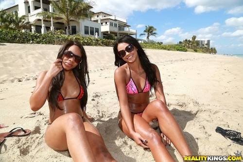 Superb girls Harley Dean and Nina in the exciting interlude at beach on nudesceleb.com