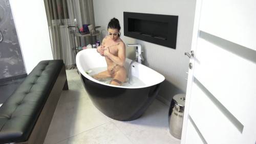 Tattooed Mature With Huge Melons Takes A Nice Shower Before Getting Laid on nudesceleb.com