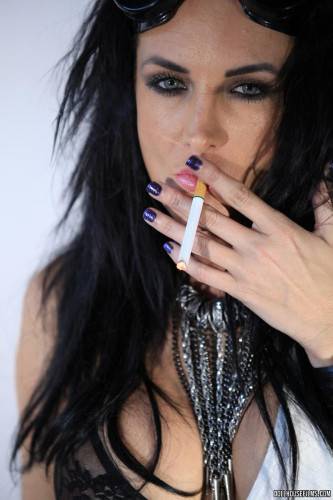 Hot Smoking Lady Alektra Blue Is Kinkily Shaking Her Naked Boobs Into Camera on nudesceleb.com