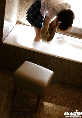 Stunning japanese teen Hina Tachibana exposes big tits and hot butt in the bathroom - Japan on nudesceleb.com