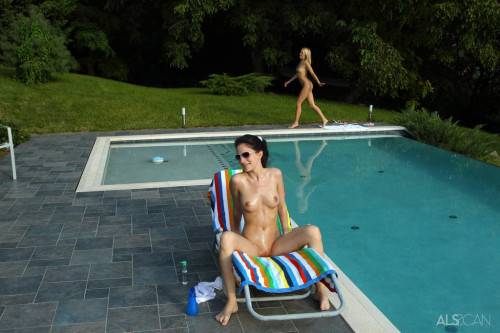 Sexy cuties Ann Marie La Sante and Blue Angel in glasses enjoy lesbian fisting near the pool on nudesceleb.com