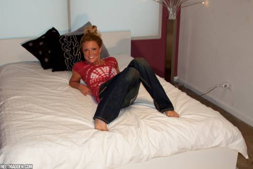 Cute Blonde Babe Meet Madden Shows Her Nice Figure As She Poses On The Bed on nudesceleb.com