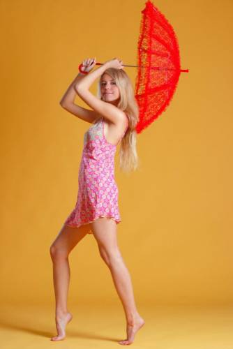 Leggy And Elegant Blonde Chick Barbara D Shows Off Her Fine Teen Bod With A Parasol on nudesceleb.com