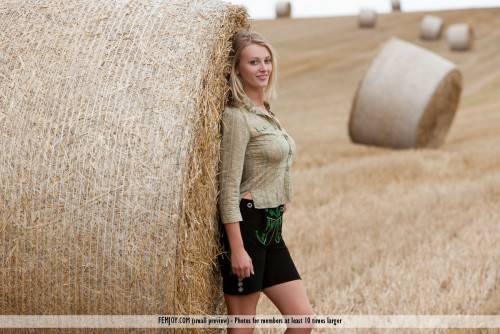 Sweet Blonde Chick Carisha Femjoy Strips And Poses Naked At The Haystack on nudesceleb.com