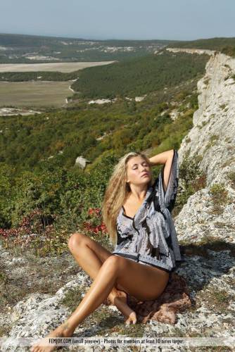The Blonde Chick April E Has Climbed The Rocks To Expose The Nude Body To The Skies on nudesceleb.com