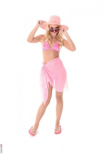 Blonde Girl In Big Pink Hat Vanda Lust Taking Off Bikini And Posing Naked on nudesceleb.com