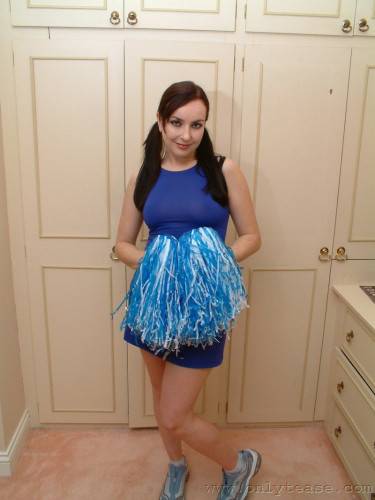 Playful Cheerleader Jessica Takes Off Her Blue Uniform And Panties Then Bends Over on nudesceleb.com