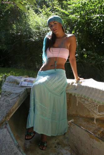 Latin Chick Isobel Riveira Lifting Her Long Skirt Up Demonstrating Hot Slit And Nasty Posing Outdoor. on nudesceleb.com
