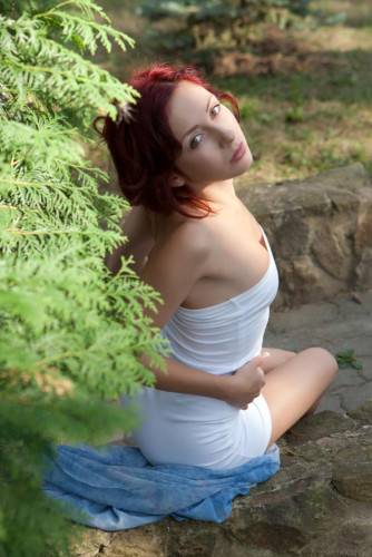 Ravishing Redhead Babe Night A Rides Up Her White Dress And Lets Us Gawk At Her Snatch on nudesceleb.com