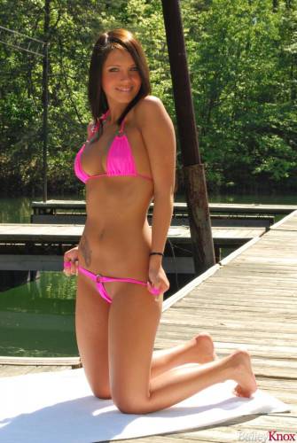 Sexy Looking Dark Haired Girl Bailey Knox Takes Her Pink Swim Suit Off During Her Outdoor Posing on nudesceleb.com