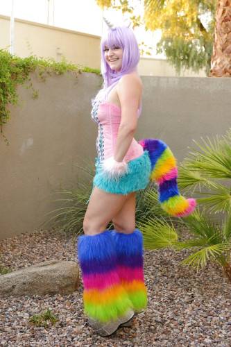 Excellent hottie Danielle Delaunay in cosplay costume baring big hooters and toying her pussy outdoor on nudesceleb.com