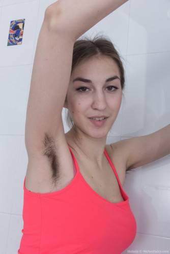 Lovely cutie Olina W revealing big titties and jerking off in bathroom on nudesceleb.com