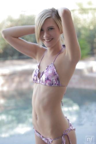 Luscious american blonde youthful Chloe Brooke in sexy bikini makes some hot foot fetish action near the pool - Usa on nudesceleb.com